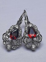 Old-style earrings set with red drop zirconia stones with snap closure