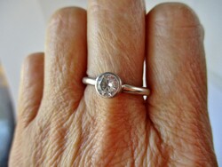 Nice classic silver solitaire ring with button socket