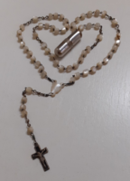 Nun's rosary made of antique mother-of-pearl with a small traveling saint in a small metal lockable jar