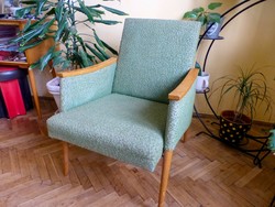 Scandinavian style pistachio green armchair