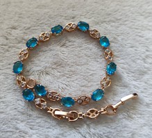 New anti-allergenic gold filled bracelet with transparent and light blue zirconia stones