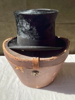 Antique Viennese top hat in a lockable box.