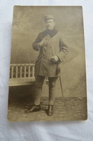 Antique military photo sheet, man in uniform, sword circa 1910-20s