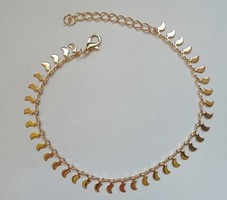 Gold colored moon anklet