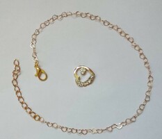 Gold-colored tiny heart-shaped anklet