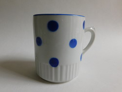 Antique Zsolnay mug with blue polka dot skirt