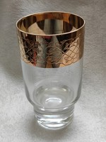A large chiseled goblet with a thick gold band border