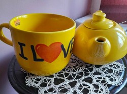 Ceramic tea mug and tea spout in sunny color
