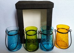 Set of four colored glass candle holders