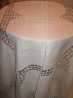 Elegant tablecloth with a lacy edge and a beautiful lace insert