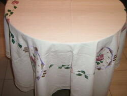 Beautiful hand embroidered antique tablecloth with lacy edges