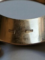 Fémjelzett 14 K  vastag mutatós karikagyűrű  7 gr   65-s méret