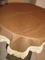 Elegant brown tablecloth with beautiful handmade crochet edges