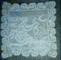 --Antique small lace tablecloth with detailed hand crochet.