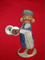 Old plastic clown toy figure with an old wooden body and a metal base, working cymbals, according to the pictures