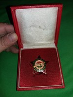 Szocréal workers guard medal for armed service with box as shown in the pictures