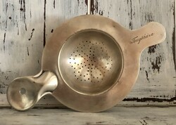 Antique silver-plated tea strainer