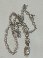 Silver women's necklace and pendant.