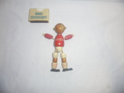 Old wooden toy figure - movable soccer player