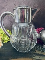 Lead crystal lemonade pitcher with ice storage with silver-plated fittings