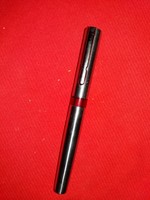 Ballpoint pen with a retro metal cap and a thick silver cover, as shown in the pictures