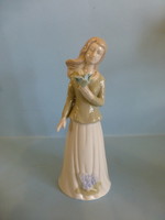 Lladro style bouquet girl