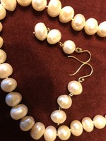 Cultured pearl string earrings with 14 carat gold fittings