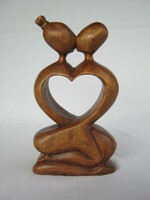 Carved wooden statue of lovers