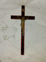 Old wooden cross with metal body