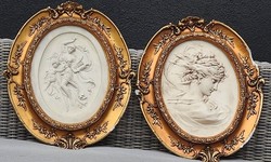 Baroque-style ceramic relief placed in a cast plaster bed (frame). Sold in pairs!