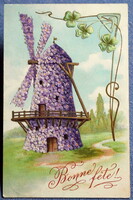 Antique art nouveau embossed greeting card made of flowers windmill 4-leaf clover from 1909