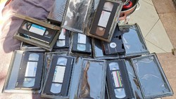 9 vhs video cassettes.