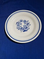 Ceramic plate with blue pattern and blue stripes