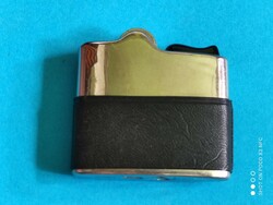 Old leather-covered flint lighter