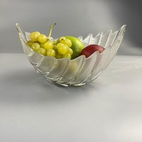 Retro fruit bowl with palm leaves