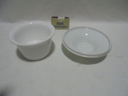 Two old porcelain tea filters together