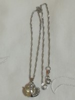 Silver-plated necklace with pendant.