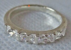 Beautiful silver wedding ring with special white zirconia stones