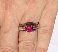Silver ring with red stones