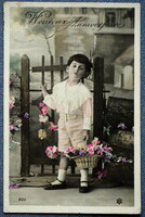 Antique greeting photo postcard - boy with flower basket from 1909