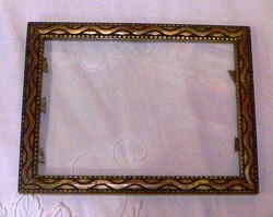 Carved wooden picture frame with glass