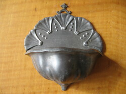 Old metal holy water container