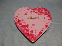 Metal box with heart-shaped candies