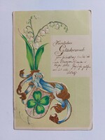 Old postcard embossed postcard with clover lily of the valley