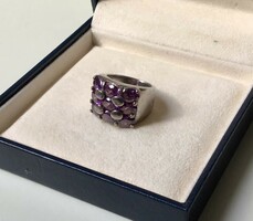 Silver ring with amethyst stones