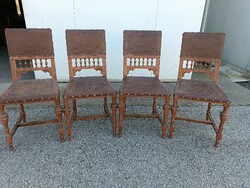 Tin German chairs with printed leather upholstery