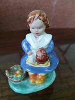 Ceramic little girl with a basket