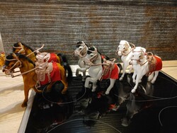 Saddled horses in pairs are children's toys or table decorations