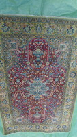Antique hand-knotted oriental Persian rug with animal figures