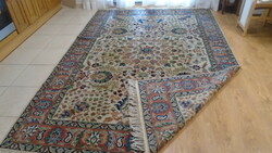 A large hand-knotted oriental wool rug in nice good condition